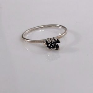 Silver ring with flower